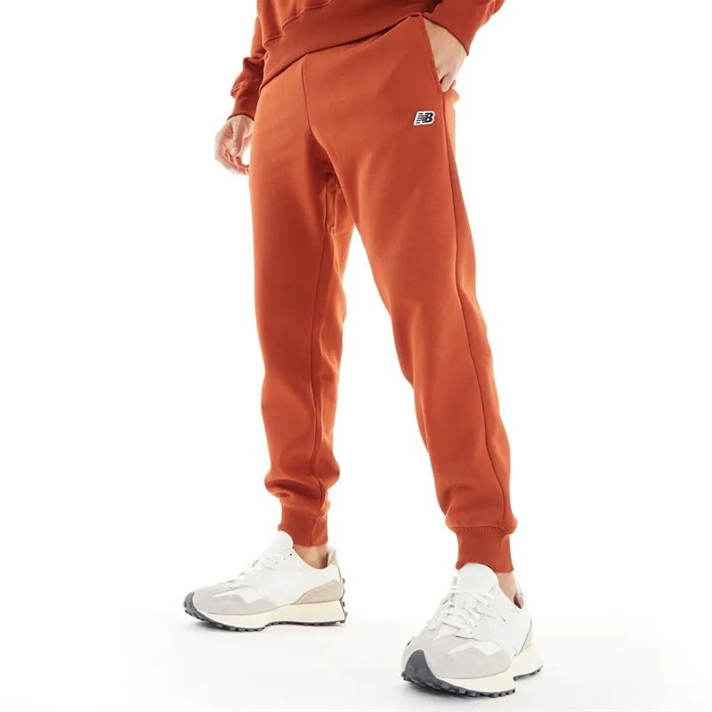 New Balance Herren Fleece-Jogginghose mit kleinem Logo Ziegelrot